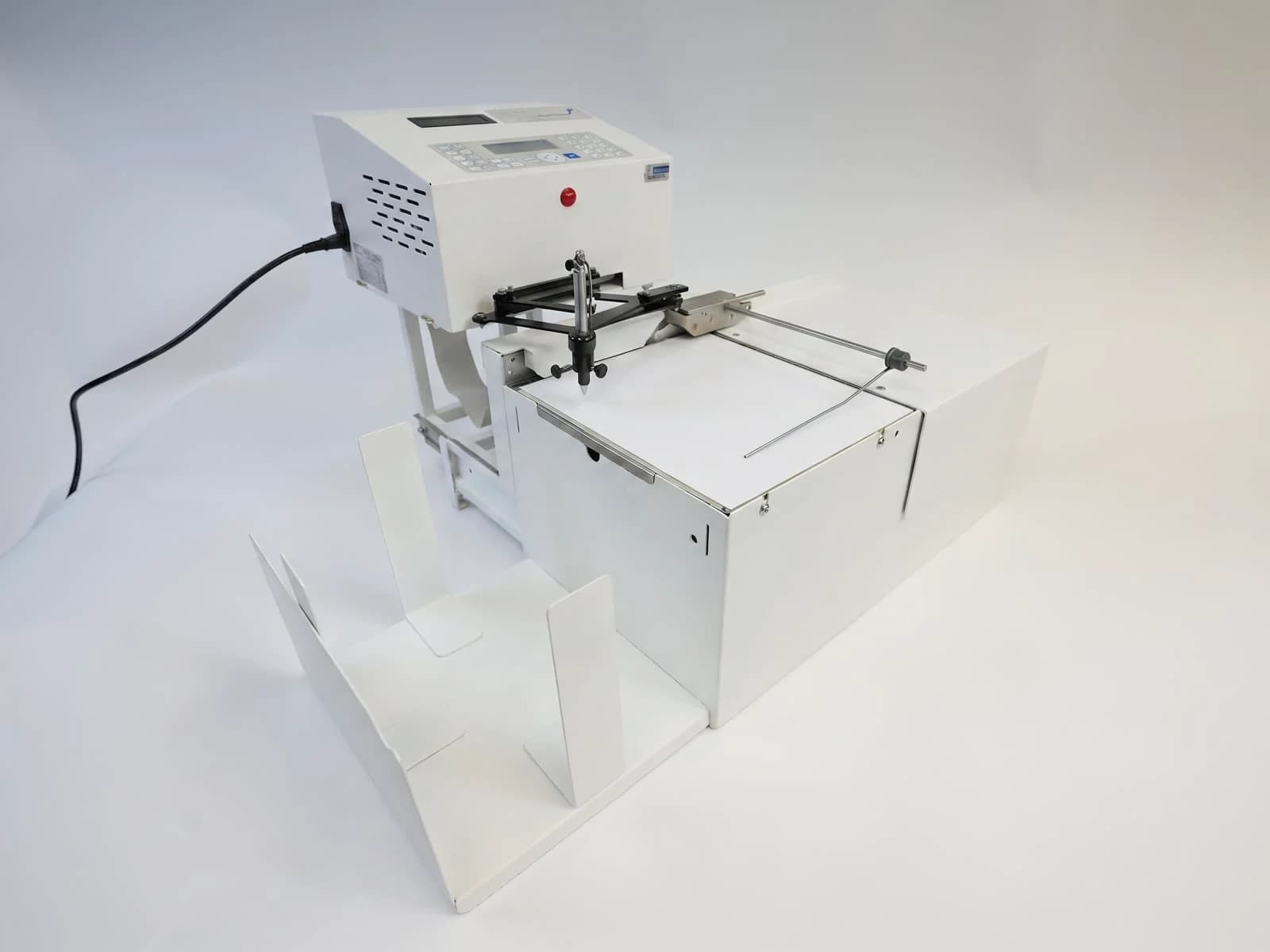Pre-owned Universal Plus Autopen machine with its envelope feeder